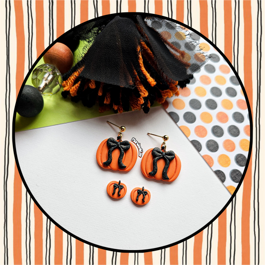 Pumpkins with Black Glitter Bows
